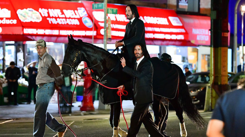 Illustration for article titled Everybody shut up and look at Keanu Reeves on a horse